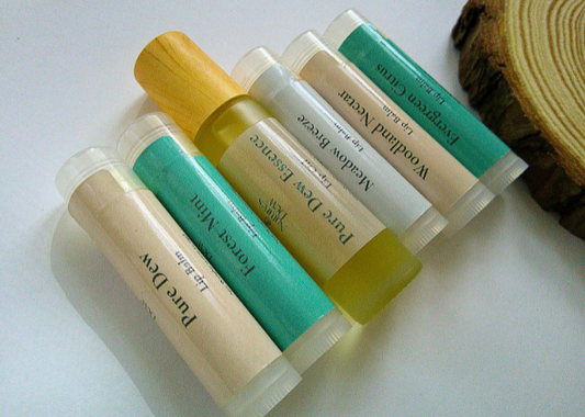 Dew-Kissed Lip Care Set with nourishing balms and hydrating oils for soft lips.