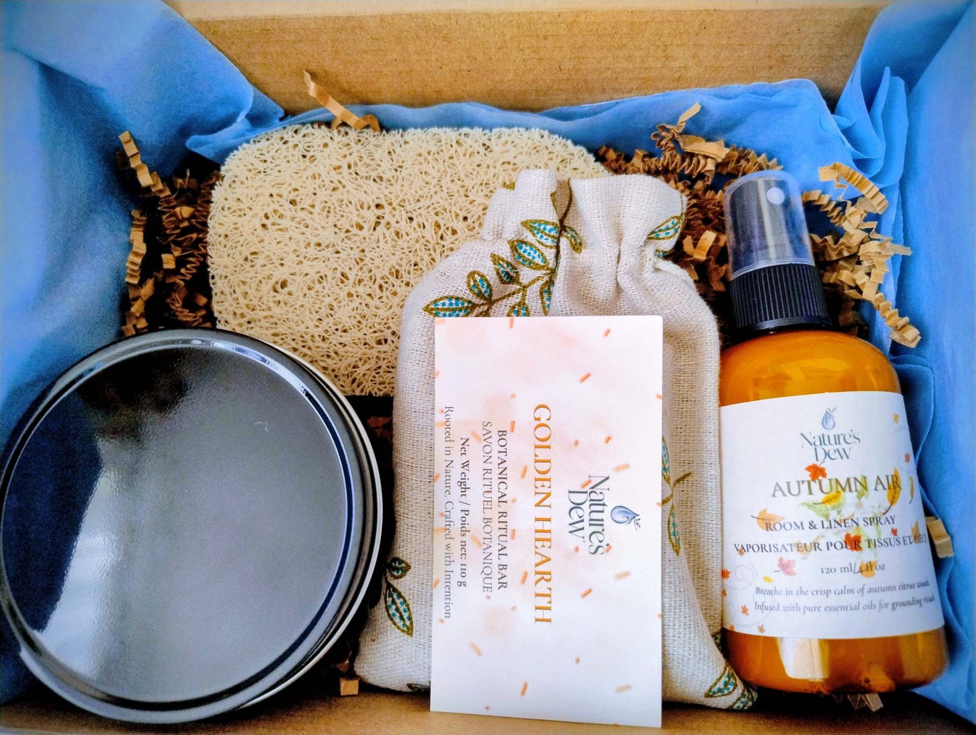 Harvest & Renewal Ritual box with Harvested Orchard Candle, Autumn Air Room Spray, Golden Hearth Ritual Soap, and soap saver pad in gift packaging