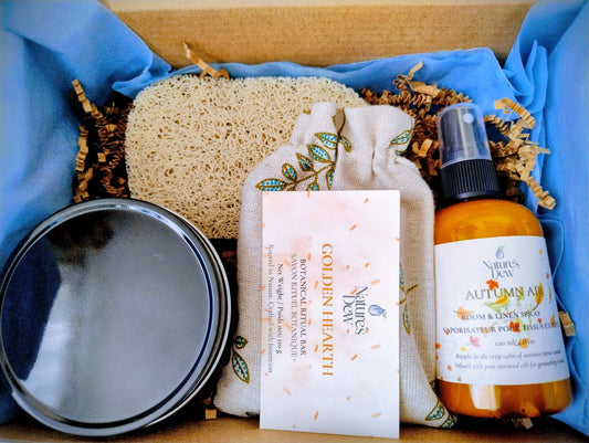 Harvest & Renewal Ritual box with Harvested Orchard Candle, Autumn Air Room Spray, Golden Hearth Ritual Soap, and soap saver pad in gift packaging