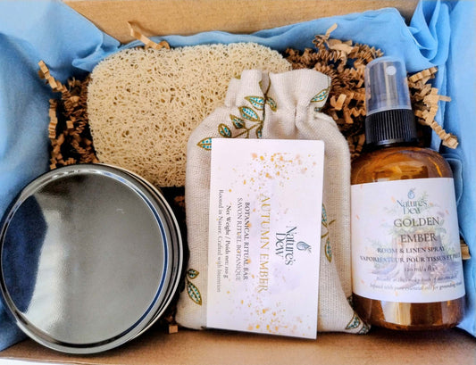 Emberwood Deluxe Ritual box with Autumn Ember soap, Golden Ember room spray, loofah, and soap saver pad in gift packaging